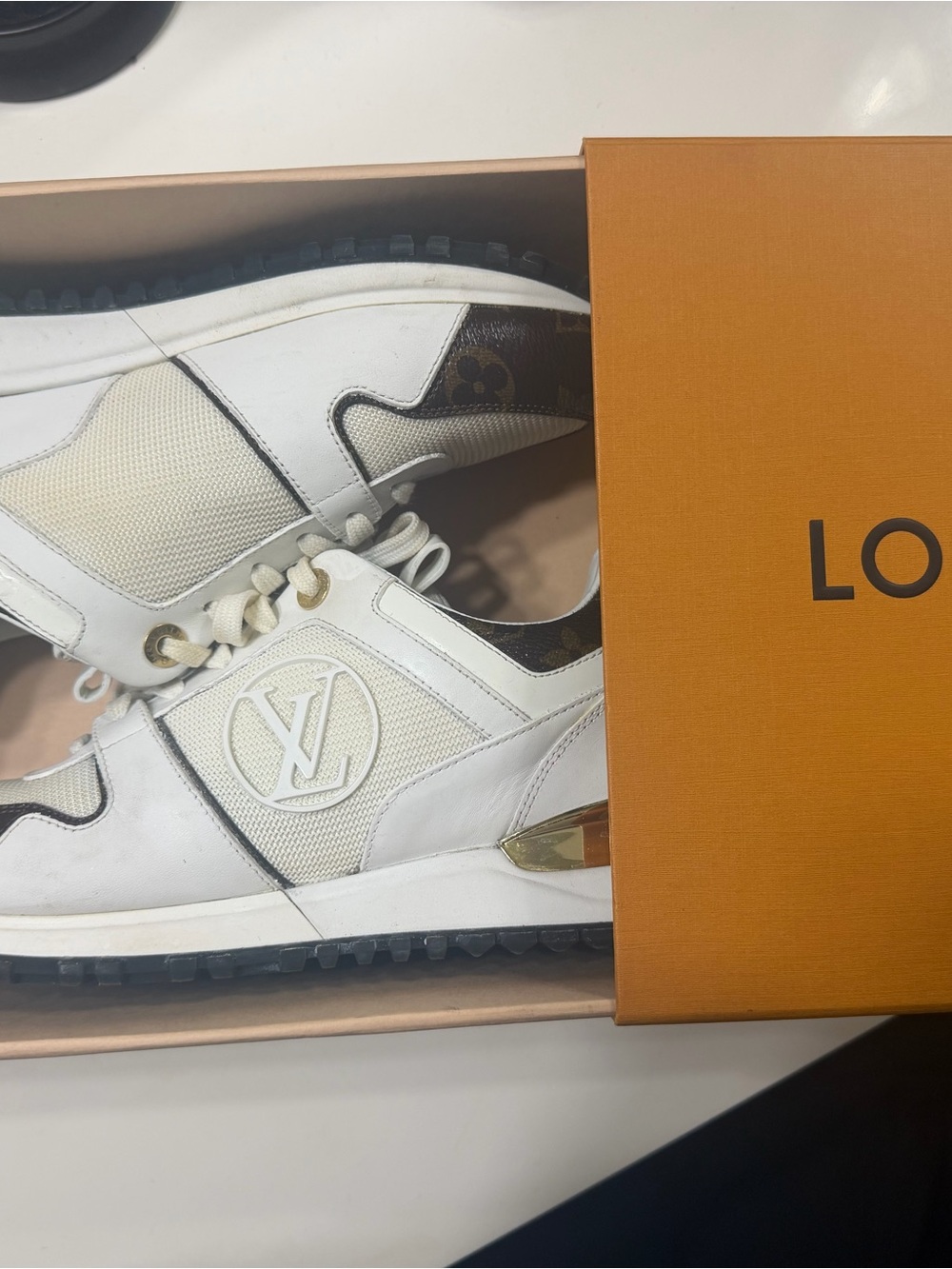 Louis Vuitton women’s White & Brown LV Runner Sneakers